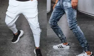 Białe i jeansowe joggery męskie, pokazujące, co to są joggery: wygodne spodnie z dopasowanymi nogawkami.
