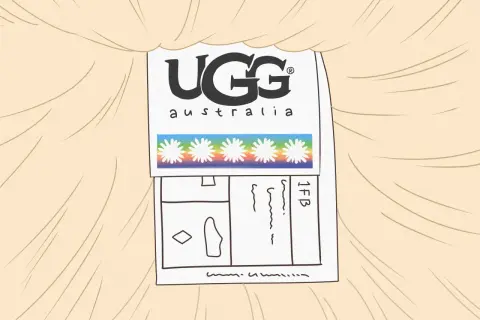 Etykieta z logo UGG Australia i tęczowym paskiem z kwiatkami. Firma UGG słynie z ciepłych, wygodnych butów.