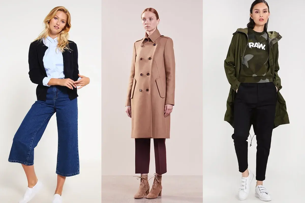 Trzy kobiety w stylizacjach: jedna w kardiganie i dzwonach, druga w płaszczu, trzecia w parkze i spodniach. Styl tomboy widoczny w swobodnych krojach.