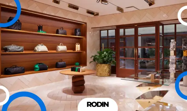 Elegancki butik z torebkami premium. Wnętrze sklepu z marką Guess, gdzie luksusowe akcesoria prezentowane są na drewnianych półkach.