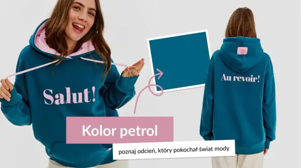 Młoda kobieta w bluzie w kolorze petrolowym z napisem "Salut!". Z tyłu bluzy napis "Au revoir!".